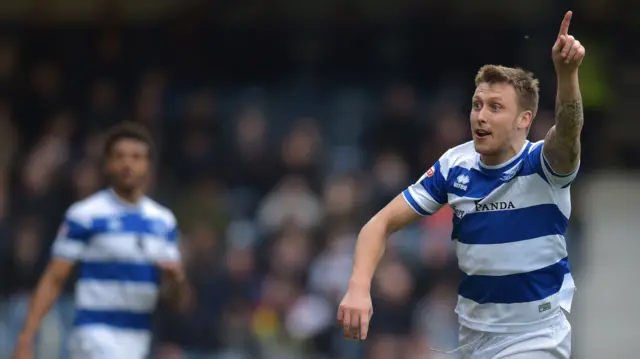 Luke Freeman celebrates scoring for QPR