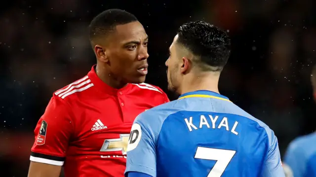 Manchester United's Anthony Martial and Brighton's Beram Kayal