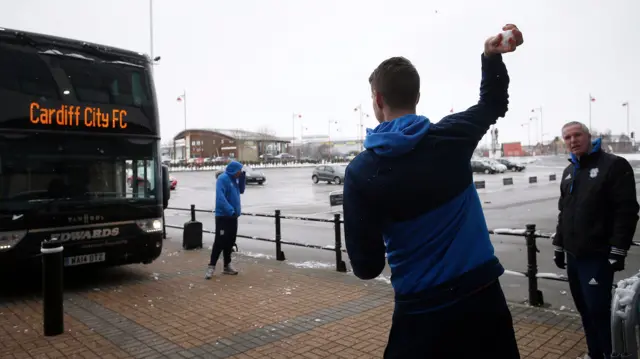 Cardiff players throw snowballs