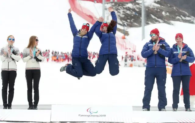 Menna Fitzpatrick and guide Jen Kehoe celebrate their gold medals