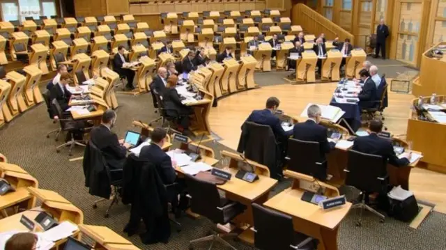 The Finance Committee met in Holyrood's main debating chamber due to the number of members taking part