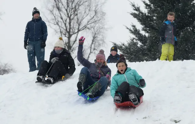 People sledging at Whitchurch golf course