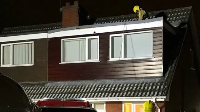 Firefighter on roof