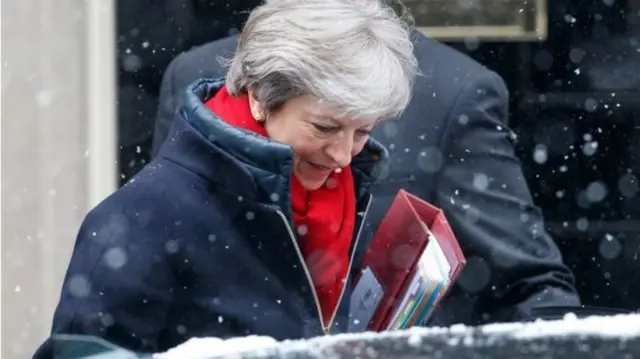 Theresa May in the snow