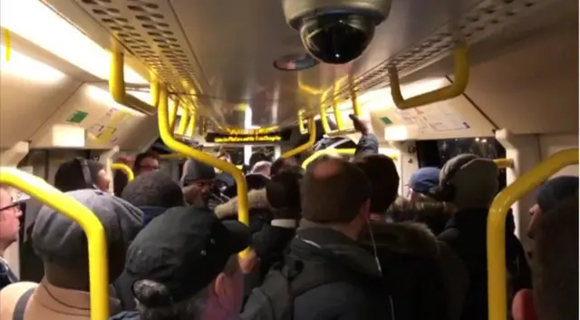 People crammed into a train