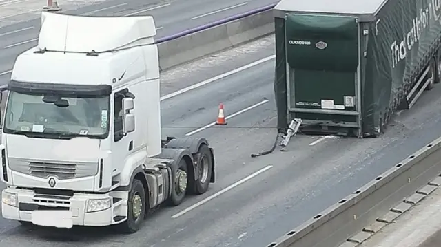 Lorry with trailer behind