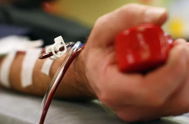 A person donating blood