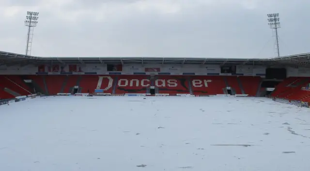 Keepmoat Stadium with snow on the surface