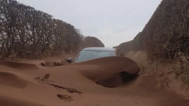 Mud covered snow