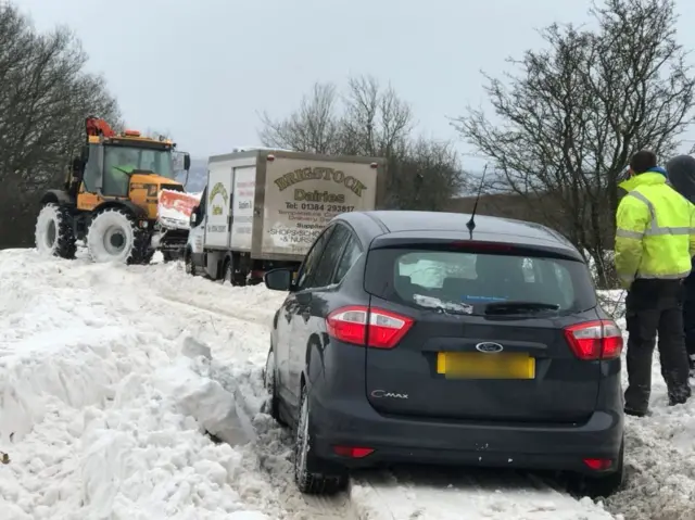 A plough in the snow and stuck cars, Egghill Lane, Birmingham