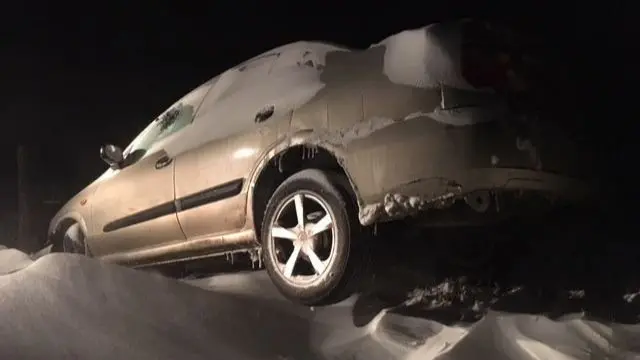 Car stuck in snow