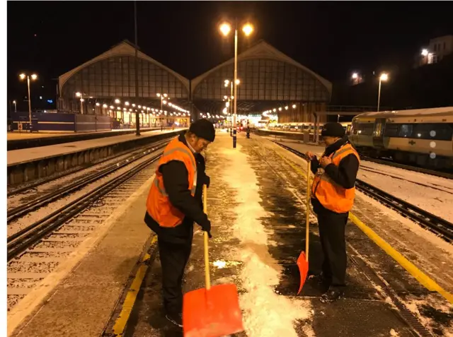 Workers on a railway line