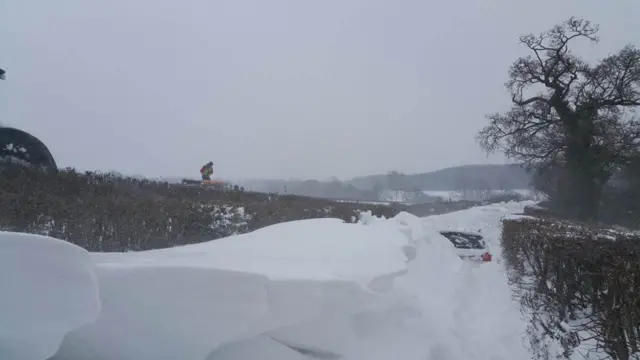 A car buried in snow in Cowbridge