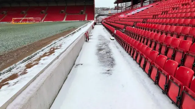 Oakwell with snow in the stands