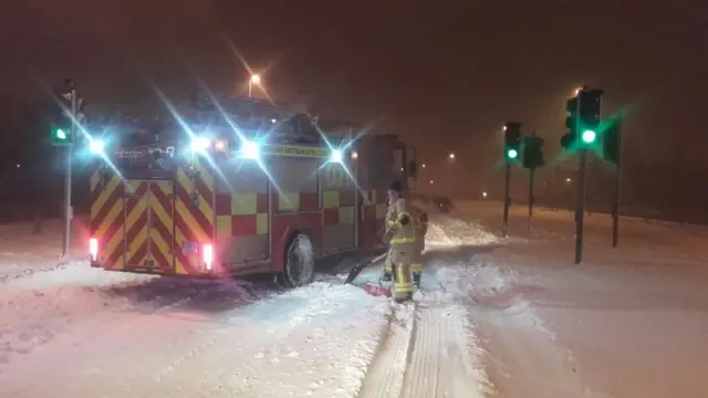 Fire engine in snow drift