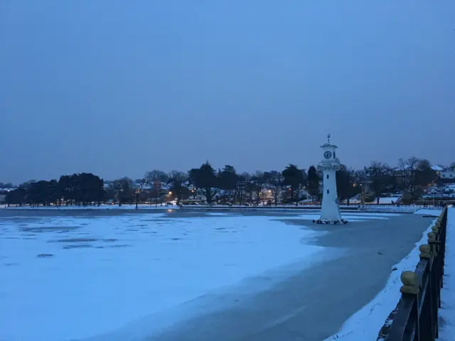 A frozen Roath Park lake in Cardiff