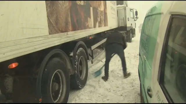 Digging lorry out from snow