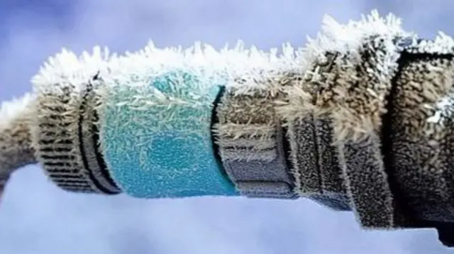 Hose pipe covered with ice