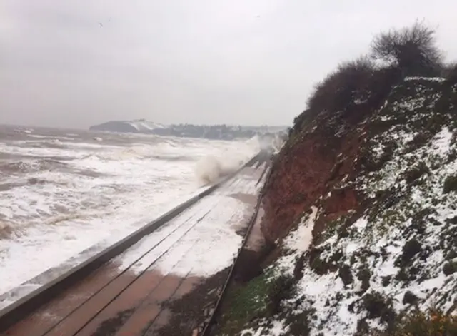 The Dawlish railway being battered by waves