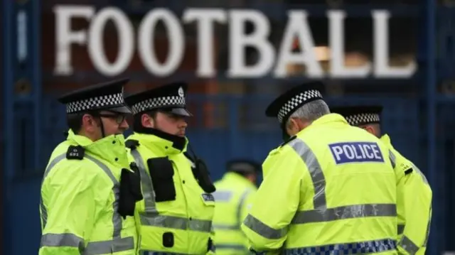 Police outside a football ground