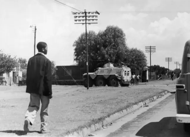 Armoured vehicles in the streets of Sharpeville, during rioting in response to laws requiring black citizens to carry passes. (