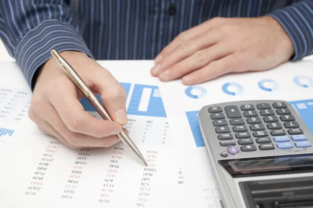 A man working on calculations