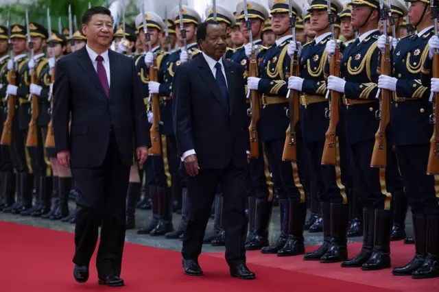 Chinese President Xi Jinping (L) accompanies President of Cameroon Paul Biya (R) to view an honour guard during a welcoming ceremony inside the Great Hall of the People on March 22, 2018 in Beijing, China. At the invitation of Chinese president Xi Jinping, President Paul Biya of the Republic of Cameroon will pay a state visit to China from March 22nd to 24th.