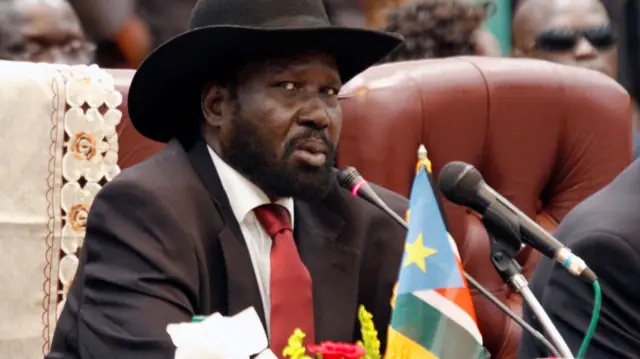 South Sudan's President Salva Kiir attends a one-day summit on oil on September 3, 2013 in Khartoum. Sudan and South Sudan averted a shutdown of economically vital oil flows and again pledged to implement economic and security pacts that have twice failed to take effect.