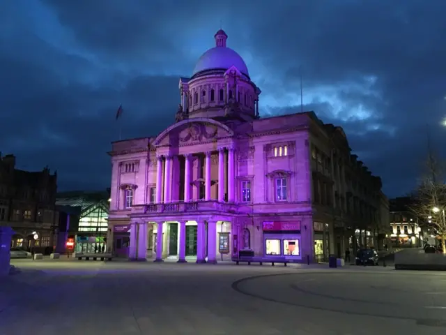 Hull City Hall bathed in purple light