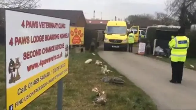 Police outside dog kennels