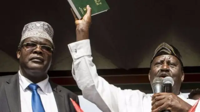 Miguna Miguna (L) and opposition leader Raila Odinga