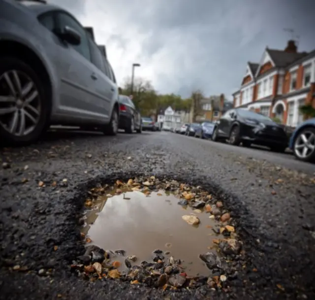 pothole in road