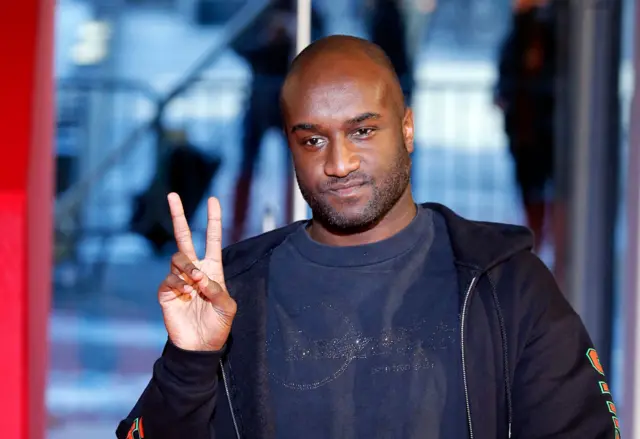 US designer Virgil Abloh acknowledges the audience at the end of the Off/White Menswear Fall/Winter 2018-2019 show as part of Paris Fashion Week on January 17, 2018 in Paris, France.