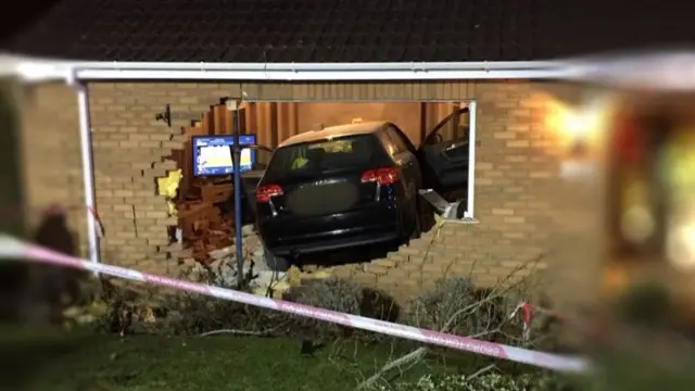 The car smashed through the house's wall