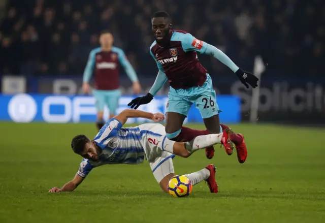 West Ham United's Arthur Masuaku in action with Huddersfield Town's Tommy Smith