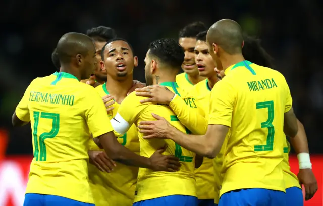 Brazil players celebrate going one up against Germany