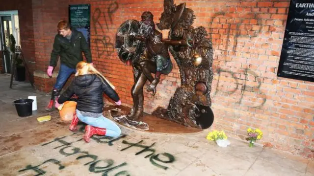 Volunteers clean vandalised David Bowie statue in Aylesbury