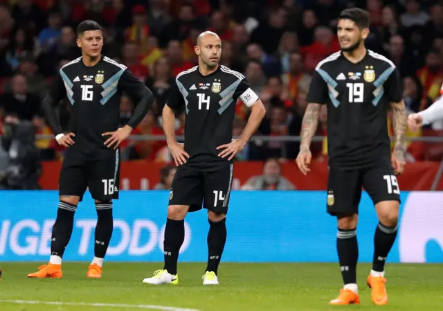 Argentina's defenders in despair during their friendly defeat to Spain