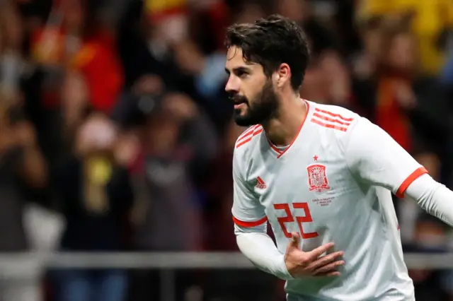 Isco bows after scoring Spain's second against Argentina