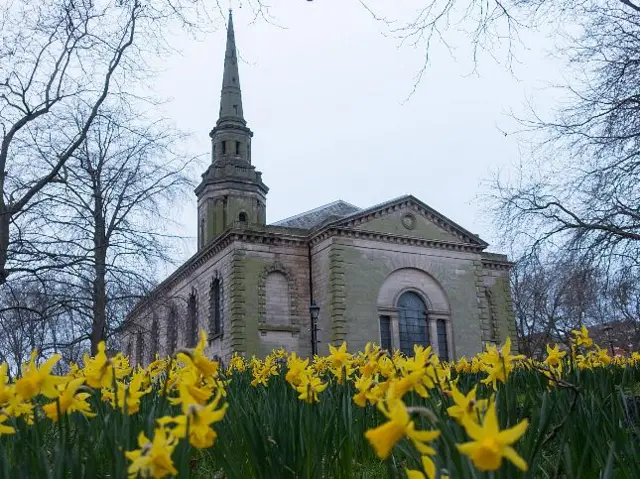 Daffodils near church