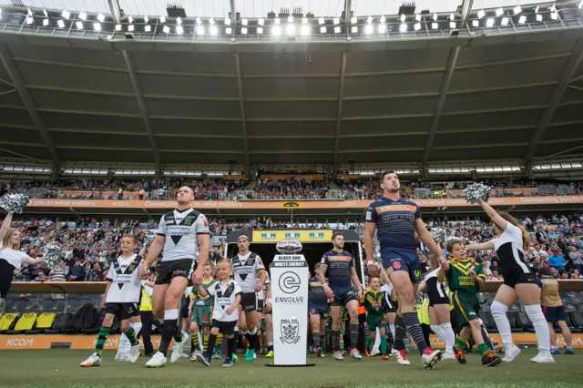 Hull FC and Hull KR emerge from the tunnel at the KCOM Stadium