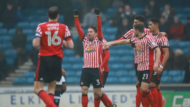 Bryan Oviedo celebrates a goal against Millwall