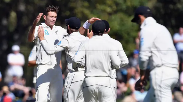 Tim Southee celebrates after dismissing Joe Root