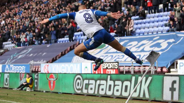 James Vaughan celebrates a goal for Wigan Athletic