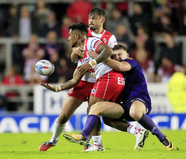 Ben Barba tussles with George Williams