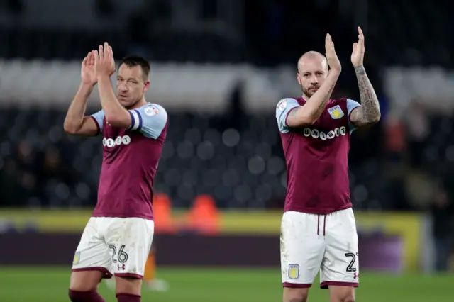 John Terry and Alan Hutton applaud