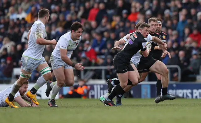 Joe Simmonds with the ball for Exeter