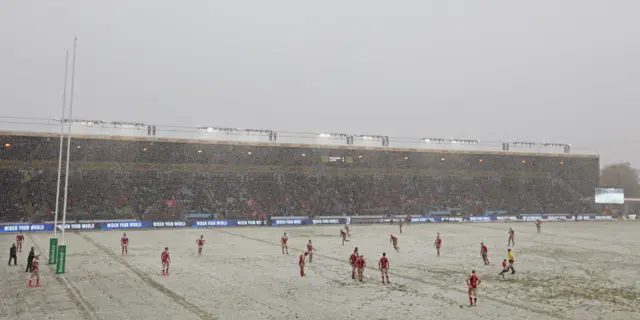 Rugby union being played in the snow