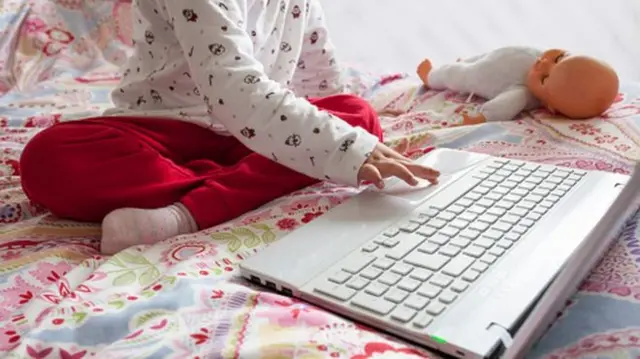 Child using laptop