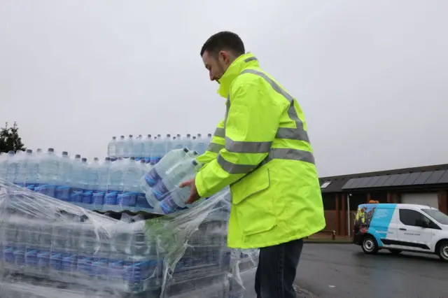 Man with bottles